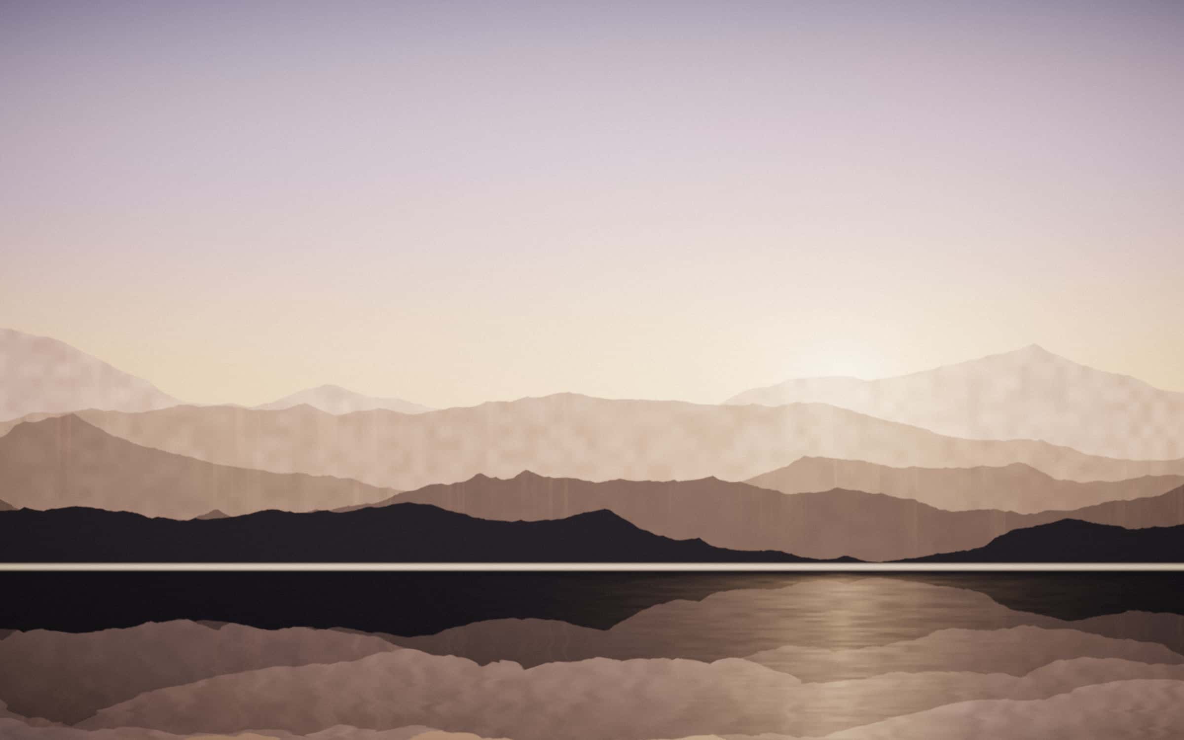 Mountain ridges at dusk reflected across a still infinity pool edge