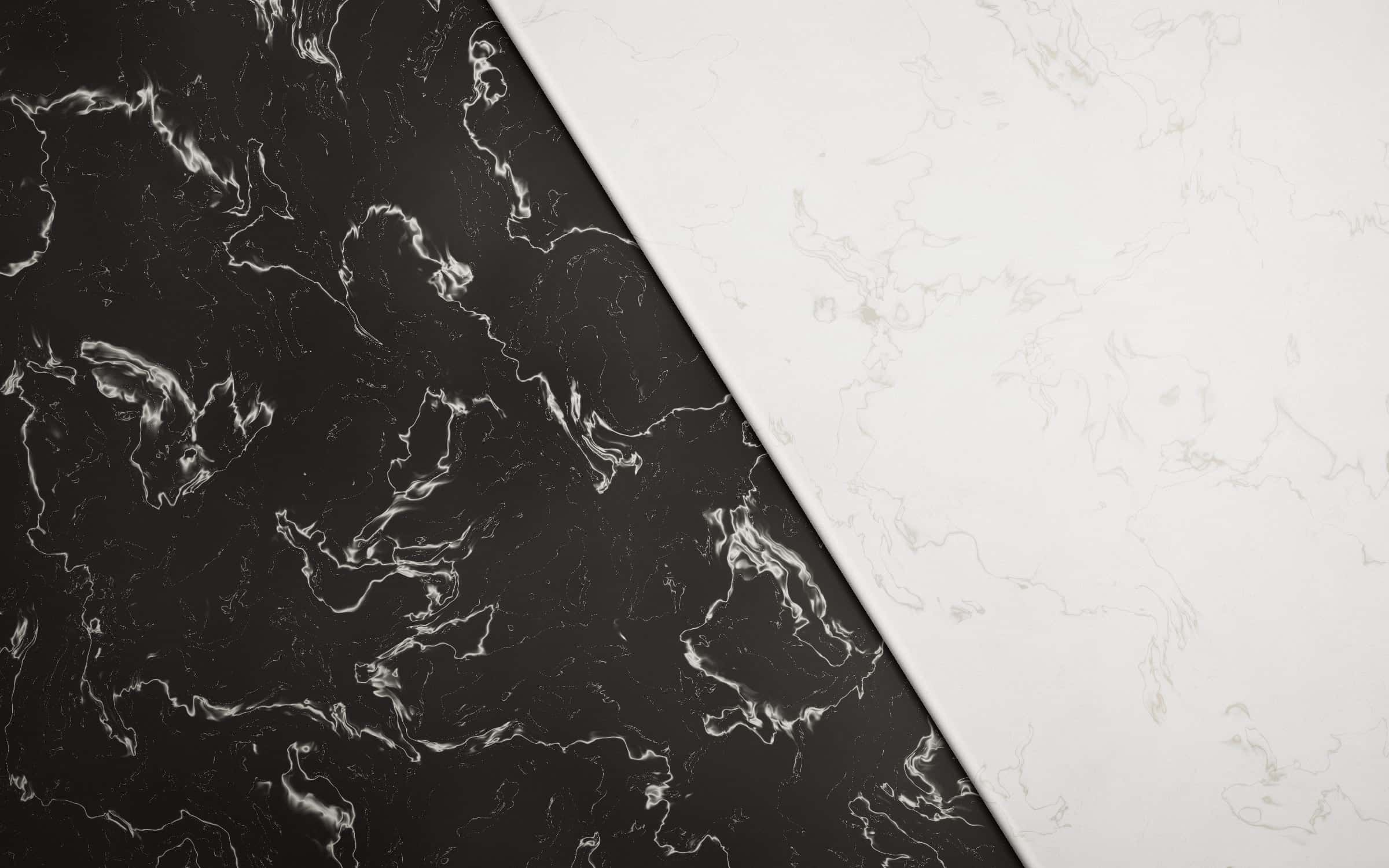 Black Nero marble meeting white Calacatta marble along a honed diagonal seam