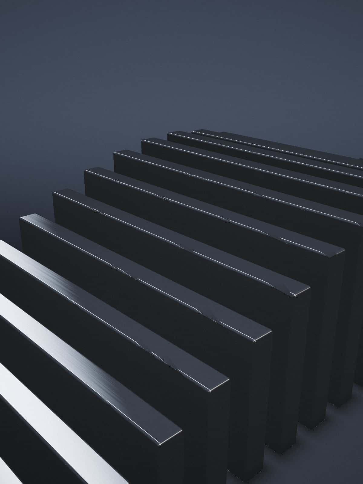 Rows of brushed metal fins in a dark studio