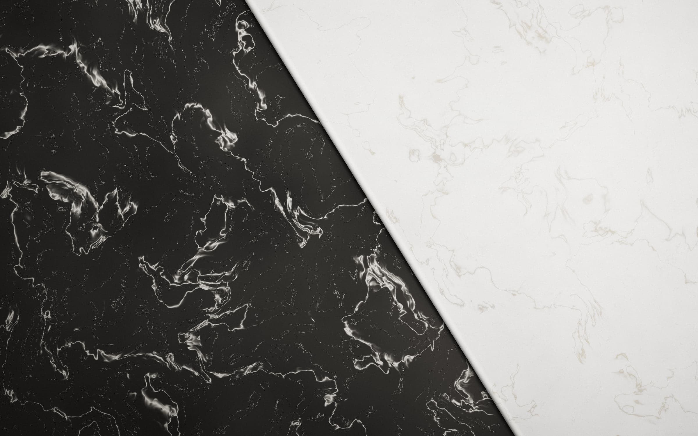 Black Nero marble meeting white Calacatta marble along a honed diagonal seam