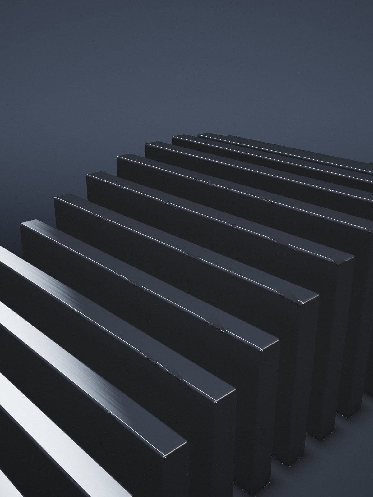 Rows of brushed metal fins in a dark studio